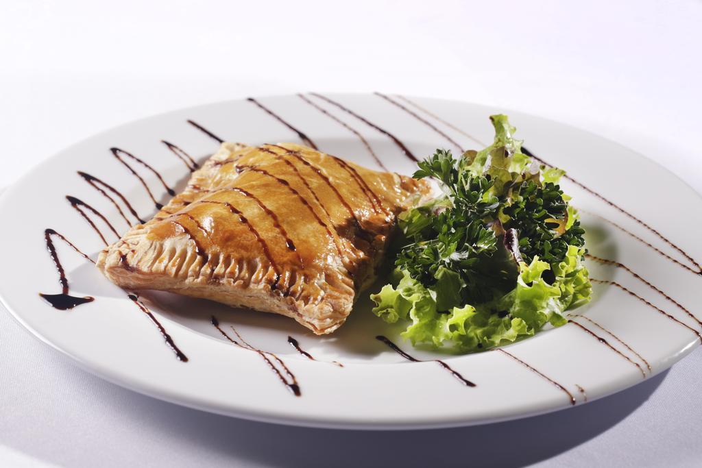 Sheraton Reserva Do Paiva กาโป เด ซันโตอากอสตีโญ ภายนอก รูปภาพ A plate of empanadas