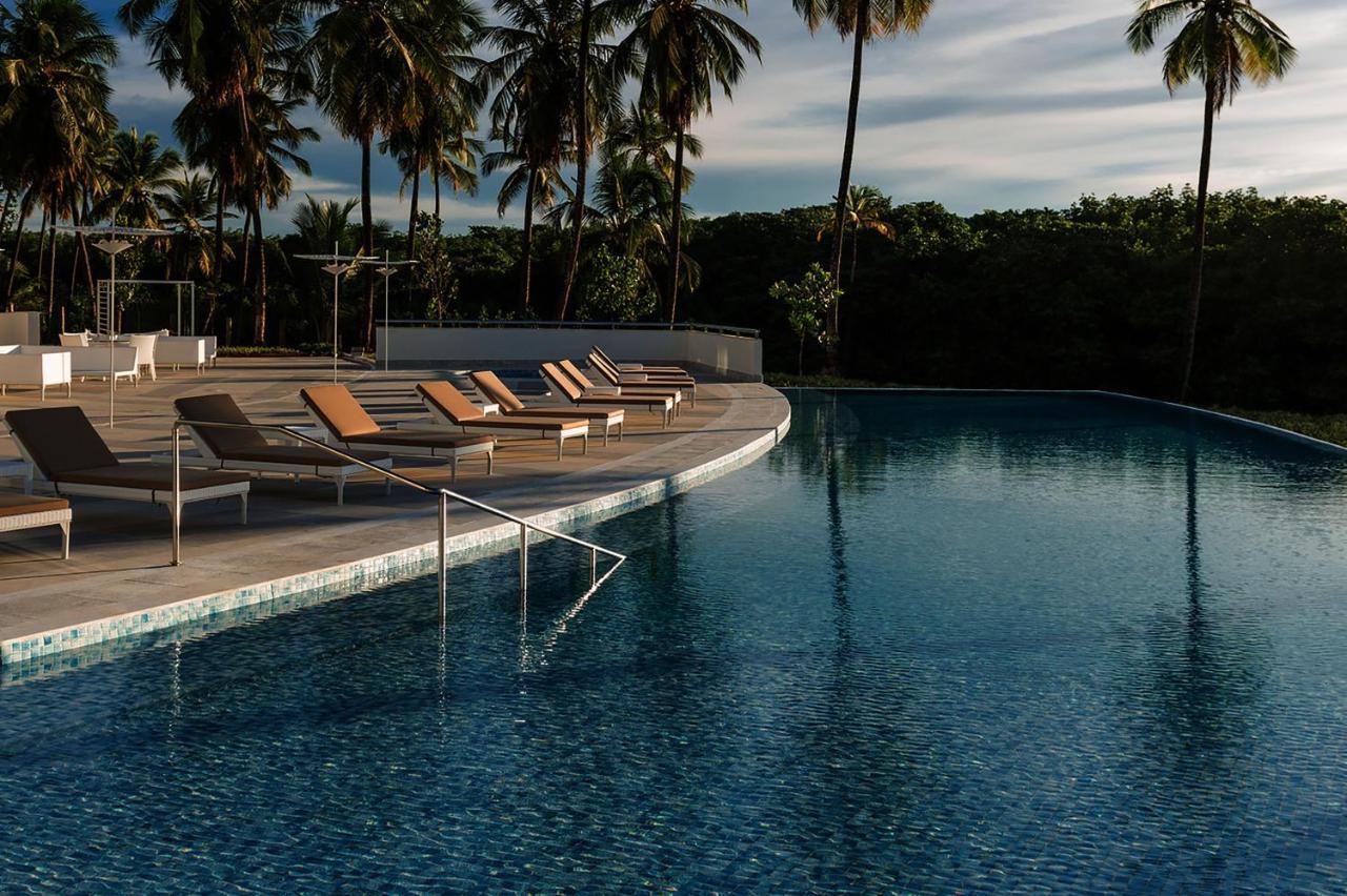 Sheraton Reserva Do Paiva กาโป เด ซันโตอากอสตีโญ ภายนอก รูปภาพ The pool at the hotel